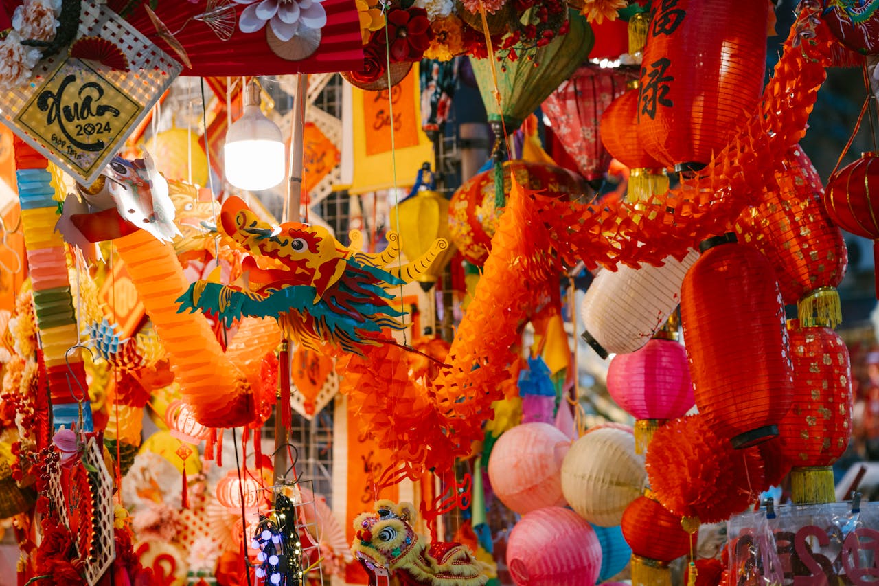 creative-03 Vibrant decorations and lanterns at a Tet holiday market stall illuminate the cultural celebration.